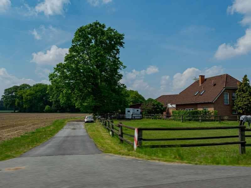 Due Diligence Survey Recorded Access Talladega Alabama | Talladega Land Surveying Rural driveway connecting a property to a public road during a due diligence survey for recorded access in Talladega Alabama.